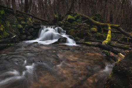 Waterfall in green forest river stream landscape. Beatiful landscape.の写真素材