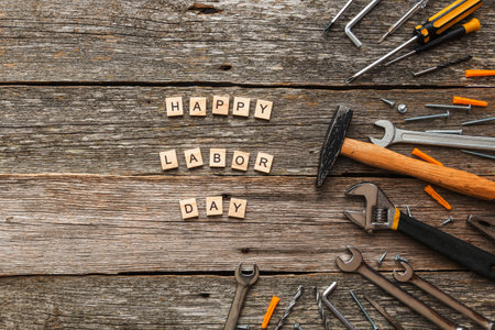 Happy labor day greeting card or background. Wooden background.