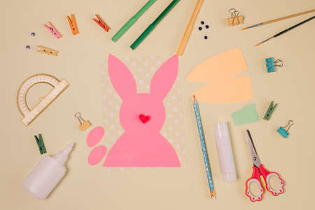 DIY and kids creativity. Step by step instruction: Create an Easter card with bunny and carrot. Childrens handmadeの写真素材