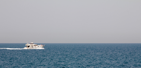A yacht at the Jumeirah beach area in Dubai, UAEの写真素材