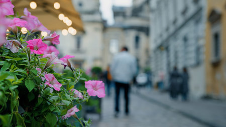 Blurred focus evening city diverse people walk along narrow historical street man tourist traveler walking around interesting tourist places sightseeing walks outdoors worldwide traveling walking tourの写真素材