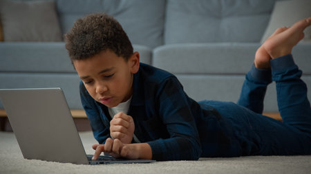 Ethnic African American multiracial multiethnic boy little 10s child kid baby schoolboy pupil son...