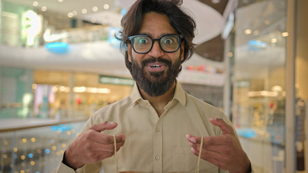 Indian excited happy surprised cheerful man buyer client customer businessman Arabian bearded guy in...