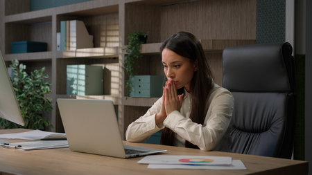 Caucasian business woman working on laptop feel stressed about system virus shocked girl businesswoman computer failure trouble important data loss outraged with website mistake malware loosing errorの写真素材