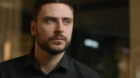 Male portrait concentrated Caucasian man adult businessman look aside think thoughts solve business problem looking distance search watching thoughtful pensive entrepreneur thinking in company officeの写真素材