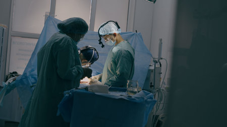 Process of trauma surgical operation professional team medical nurses doctors surgeons perform heart...