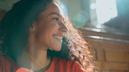 Portrait happy smiling laugh toothy smile joyful Latina Hispanic woman girl student learning in...