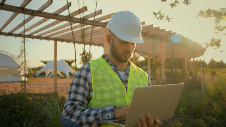 Thoughtful Caucasian male man experienced worker inspector helmet hardhat guy engineer technician...