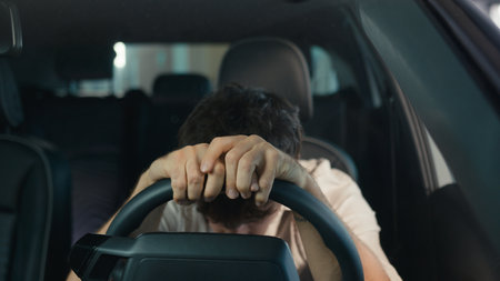 Frustrated stressed worried irritated angry Caucasian driver worry about traffic jam lateness business failure relationship breakup auto broken lost man problem sit in car automobile driving troubleの写真素材