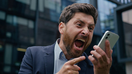 Annoyed mad crazy business man angry furious Caucasian businessman guy male boss employer aggressive...
