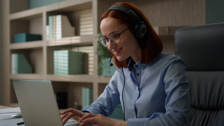 Caucasian smiling businesswoman business virtual meeting conference in office woman girl in headset...
