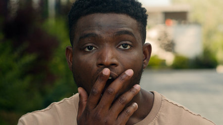 Emotional African American man amazed surprised face biracial ethnic wonder shocked stunned guy...