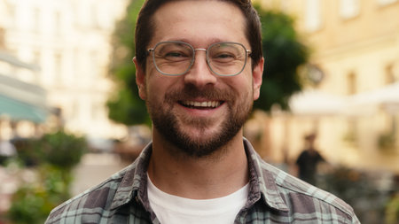 Smiling man happy bearded guy Caucasian businessman tourist customer traveler in eyeglasses cheerful...