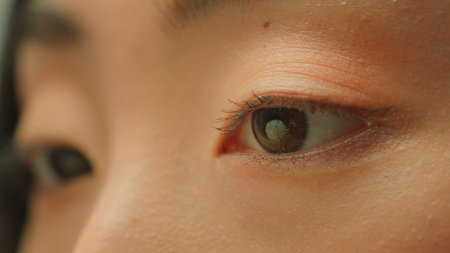Eye human dark iris macro shot woman beauty female open eyes extreme close-up Asian chinese korean japanese healthy girl clear vision looking blinking eyelashes health eyesight ophthalmology clinicの写真素材