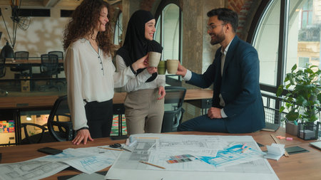 Team architects contractors engineers business colleagues Arabian Muslim Caucasian businessman...