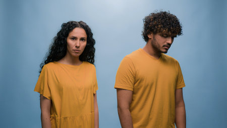 Studio portrait happy smiling singing woman girl listening to music with headphones dancing listen radio dance move at blue background headset sound audio fun song rhythmの写真素材