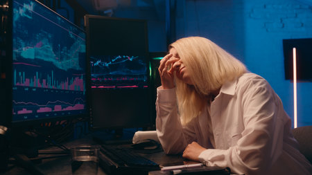 Businesswoman girl Caucasian woman business female crypto currency trade bitcoin investor programmer late night work tired exhausted overtime headache itchy eyes tension overwork computer bad eyesightの写真素材