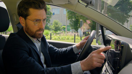 Caucasian man male businessman guy upset driver car owner inside automobile stressed confused auto...