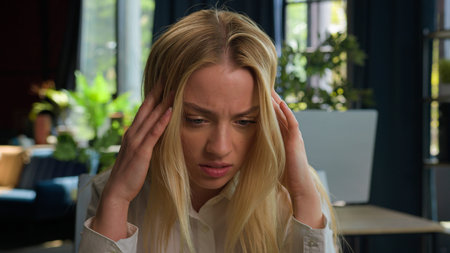 Stressed desperate Caucasian businesswoman gen z girl female entrepreneur working in office finances...