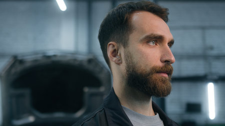 Professional bearded auto mechanic maintenance engineer specialist Caucasian man car service manager...