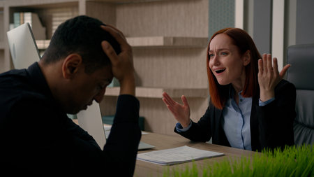 Angry businesswoman displeased leader screaming at office worker demanding boss annoyed at employee...