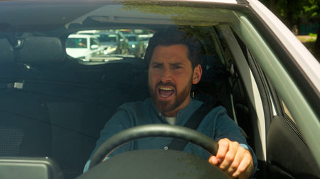 Angry irritated Caucasian man annoyed businessman male guy driver stuck traffic jam road accident...