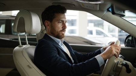 Caucasian adult man businessman driver male touching wheel car auto rental service salon buyer...