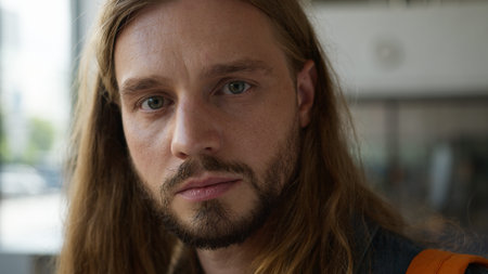 Caucasian pensive student guy man male thinking thoughtful look away serious face expression looking...