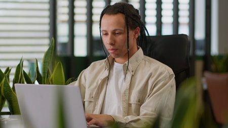 African American ethnic multiracial man business male professional creative guy businessman typing...
