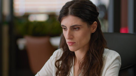 Caucasian business woman employee female manager girl entrepreneur clerk manager businesswoman laptop online studying working typing pc computer tasks browsing internet at office workplace companyの写真素材