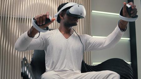 African American cyber man in white futurism studio male guy futuristic wearing vr glasses virtual...