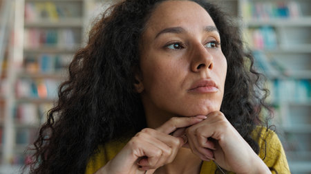 Tired Arabian Latino woman glasses rubbing eyes female exhausted overworked student girl feel pain eyestrain ache bad vision eyesight unhealthy study learning library high school university collegeの写真素材