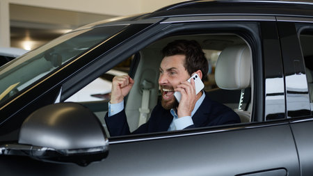 Happy Caucasian man customer buyer talking mobile phone smartphone new luxury car male auto vehicle...