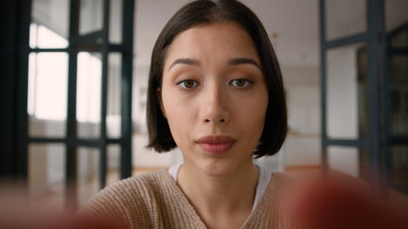 POV point of view Caucasian woman girl influencer social media scrolling mobile phone webcam at home...
