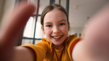 Webcam display point of view POV screen modern happy Caucasian little child girl daughter scrolling...