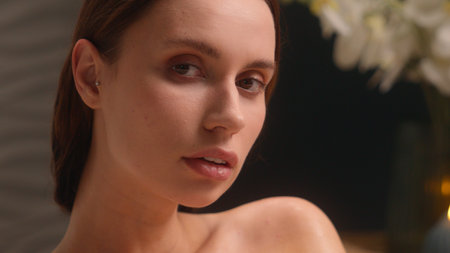 Cropped view sexy naked young Caucasian woman girl female lady relaxing in home bathroom bathtub bathing enjoy bath touching soft skin hygiene skincare beauty procedure moisturize cosmetic shower gelの写真素材