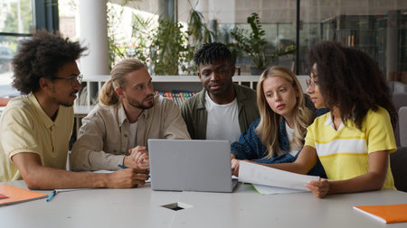 Group of multiracial diversity students e-learning together studying in high school pupils gathering...