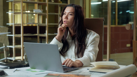 Asian woman business worker in office thoughtful businesswoman brainstorm think Japanese Chinese...