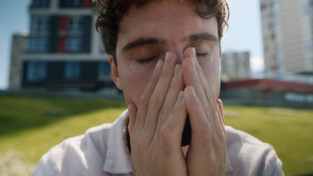 Close up tired unhappy Caucasian man covering face hands grief problems exhausted employee work male...