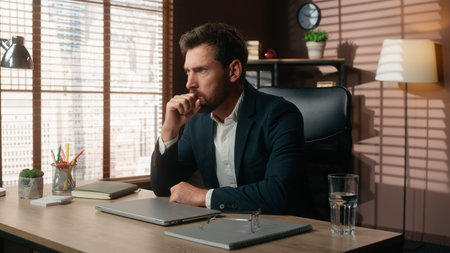 Pensive thinking sad stressed overworked business work online problem close laptop burnout nervous...
