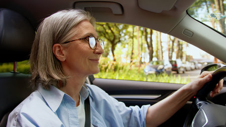 Carefree active Caucasian pensioner positive owner elderly woman buyer senior mature female auto...