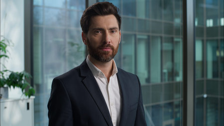 Caucasian man portrait businessman business bearded handsome male turning head looking at camera guy...