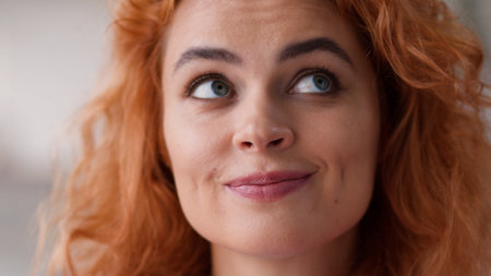 Close up Caucasian woman face pensive dreaming thinking thoughtful girl portrait lady pondering looking idea solution searching decision female decide hesitate puzzled indoor at home happy dream thinkの写真素材