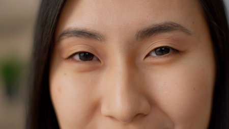 Close up eyes Asian Chinese Korean Japanese woman female lady girl looking at camera opening eye...
