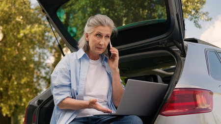 Angry irritated annoyed Caucasian mature elderly business woman female senior businesswoman...