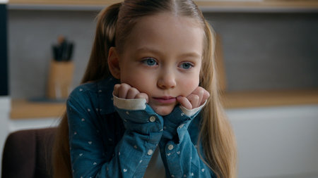 Close up frown sorrow little offended Caucasian sad upset bored child girl unhappy emotional abuse...