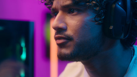 Close up hands keyboard man player gamer face computer laughter enjoy excited shout exclamation win victory success male guy cyberspace scream cybersport competition tournament gamingの写真素材