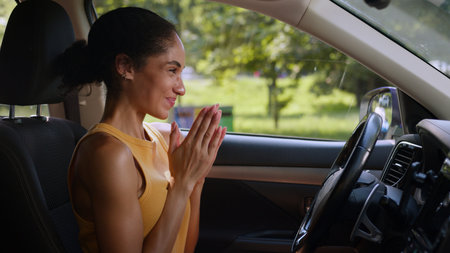 Happy African American woman business businesswoman smiling clapping hands driver female car new...
