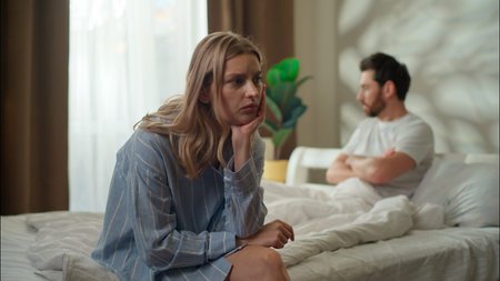 Family worried Caucasian couple ignore each other breakup argument in bedroom annoyed boyfriend...