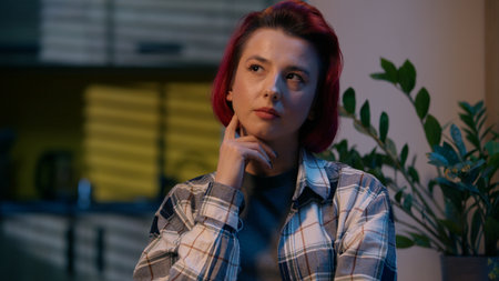Pensive thoughtful doubtful Caucasian woman thinking female at home girl ponder brainstorming unsure hesitate lady solution indoors decision difficulty think problem contemplation dreaming inspirationの写真素材